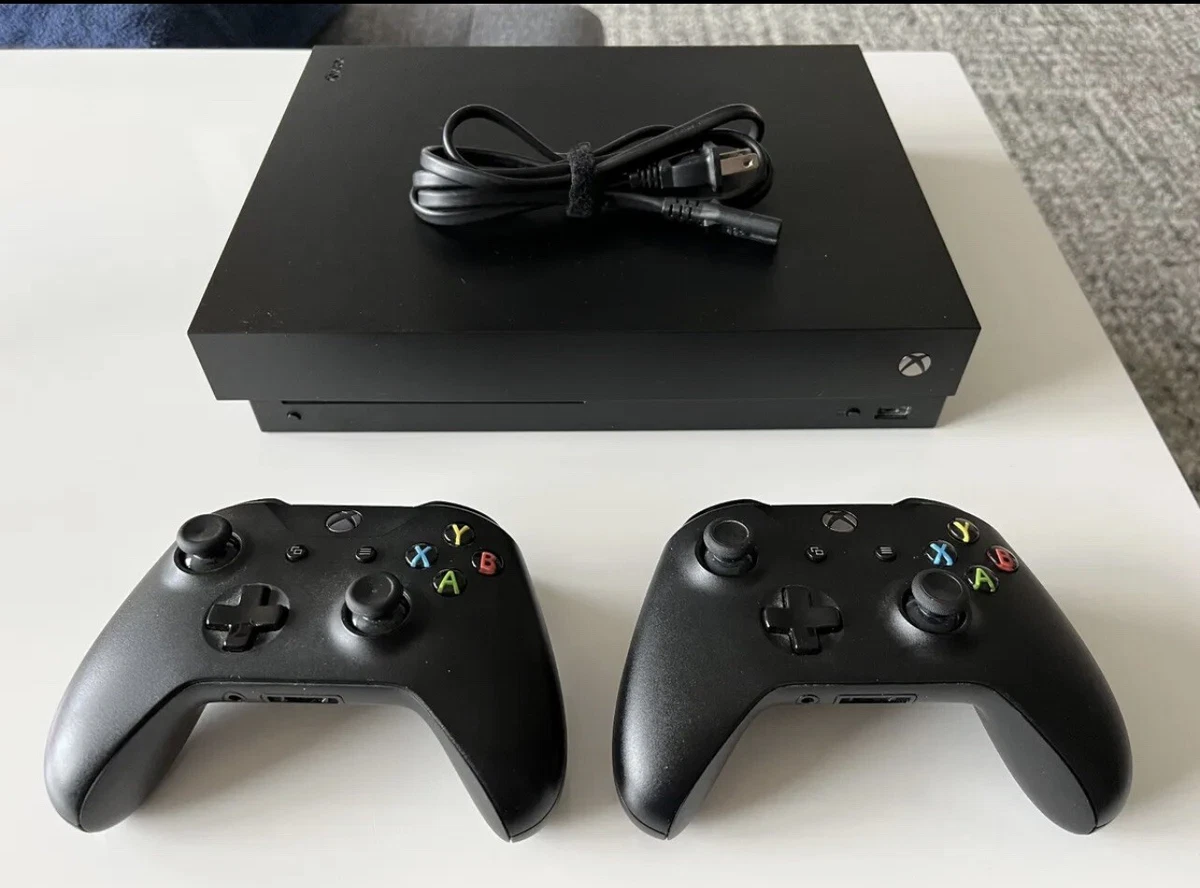 Xbox One X 2TB SSD with 2 Controllers and Original Box excellent condition