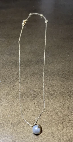 Collana mini ciondolo perle di saggezza Kate Spade nuova con etichette O0RU3110 tono oro crema