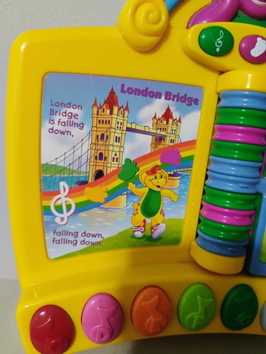 Vintage Barney der Dinosaurier musikalische Kinderreime Klavier Buch Spielzeug FUNKTIONIERT - Bild 4 von 14