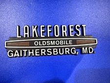 LAKEFOREST Oldsmobile Gaithersburg, MD -PLASTIC CAR DEALERSHIP EMBLEM - VINTAGE