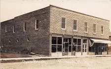 J37/ Millbrook Michigan RPPC Postcard c1910 Opera House Block Stores  176