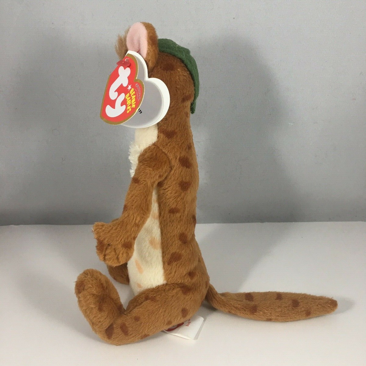 Ty Beanie Baby - BUCK the One Eyed Weasel (Ice Age 3 Movie) MINT