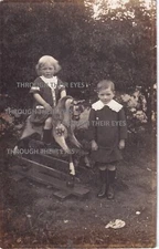 Original Photo postcard Brother & sister with  Rocking horse  c 1910
