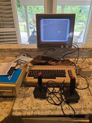 Commodore 64/ System C64 1541 Drive/ 1802 Monitor /2 Joysticks /Manuals/ Cables.