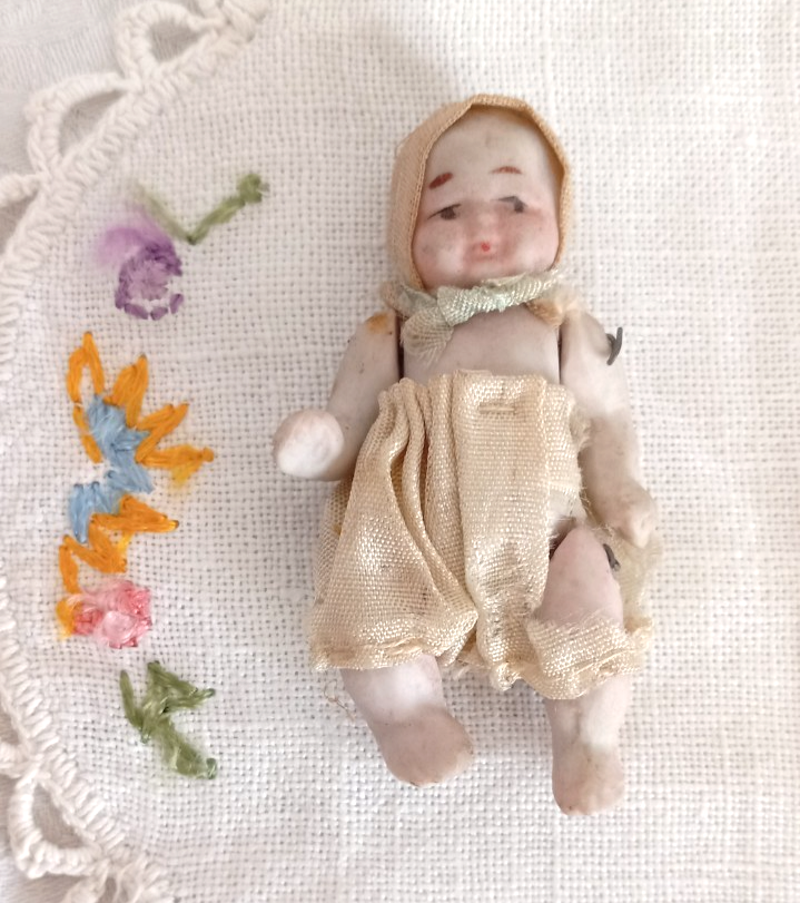 ANTIQUE BISQUE BABY MINIATURE DOLL W/ ORIGINAL CLOTHES & BONNET