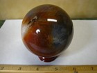 1.21b 2.8in CARNELIAN AGATE AND QUARTZ SPHERE ORANGE/REDS/WHITE MADAGASCAR #211 — photo 10