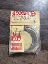 vintage package of "Log Ring" newspaper burners, Log Fireplace
