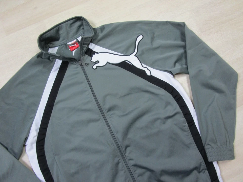 Chaqueta deportiva Puma gris con cremallera completa cuello falso logotipo grande talla (L) a rayas para hombre Foto 3 de 4