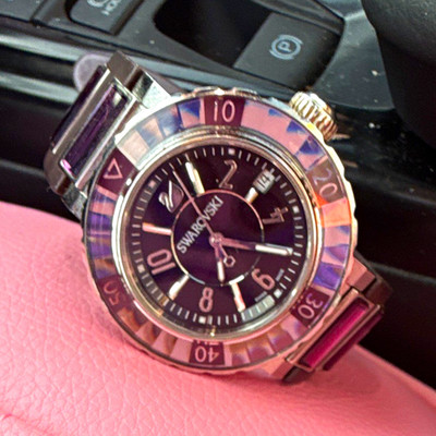 Swarovski Octea Purple Dial Silver Tone Metal Bracelet Quartz Date 30m