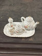 Vintage Miniature Porcelain Tea Set with Floral Design and Gold Accents