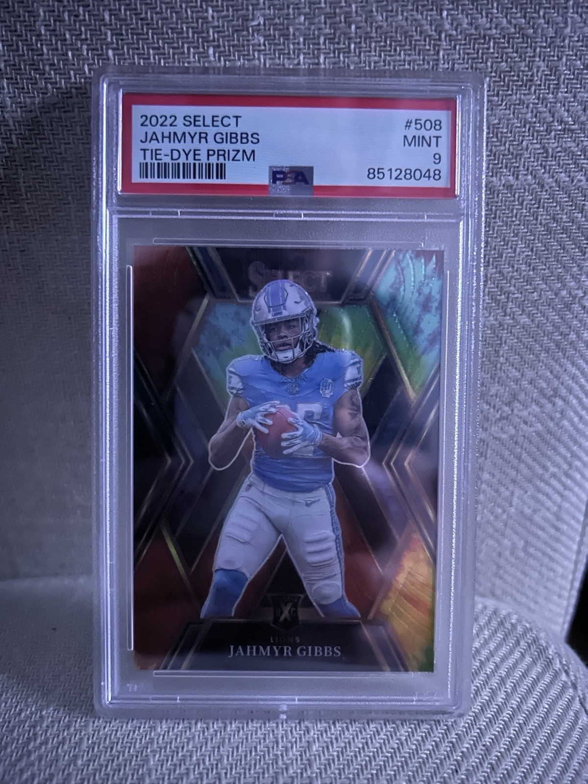 2022 Panini Select - 2023 XRC Jahmyr Gibbs #508 Tie-Dye Prizm /25 (RC)