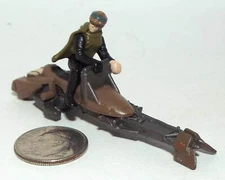 Very Small Plastic Star Wars Figure of Princess Leia on A Speeder Bike