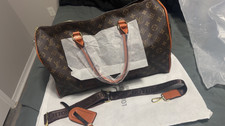 Brown Louis Vuitton duffle bag! New never use...