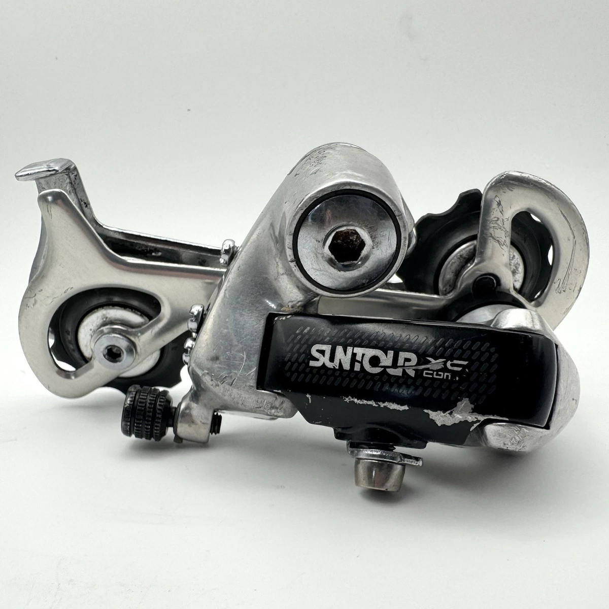 Ancien dérailleur arrière Suntour AR II 1985 cage moyenne courte