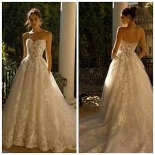 White A-line Chiffon Wedding Dress with Zipper and Sleeveless Lace Bridal Gown