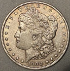 1900 O/CC MORGAN SILVER DOLLAR AU