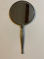 Vintage Metal Vanity Hand Held 7 Inch Circle Mirror Floral Back 14.5 Inches Long