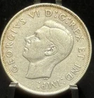 1947 Canada Fifty Cents "Maple Leaf Straight 7" 50C Silver Coin