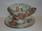 December Poinsettia Flower of the Month Footed Cup & Saucer w Gold Trim — photo 1