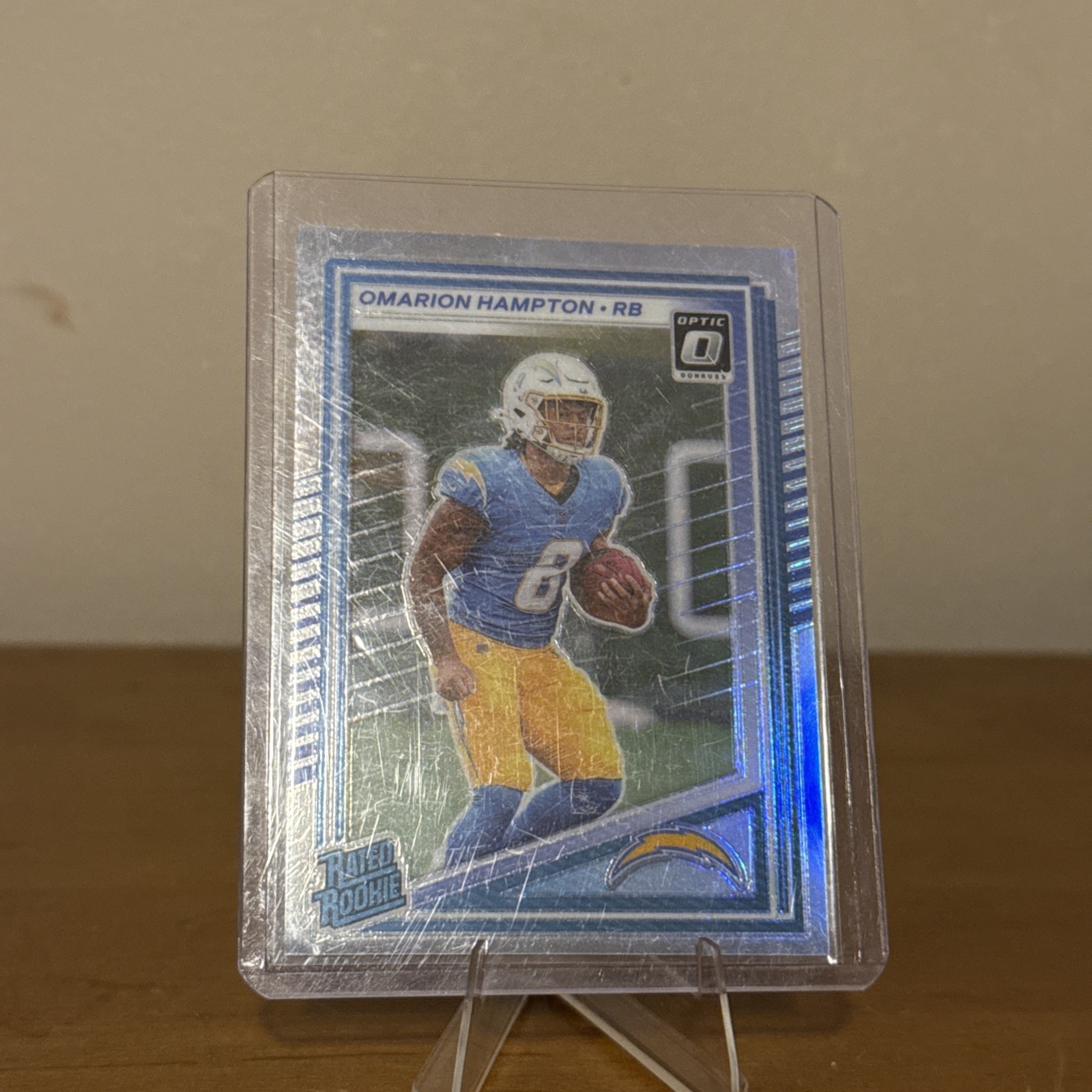 2025 Panini Donruss - Rated Rookie Omarion Hampton Optic Preview Holo Prizm (RC)