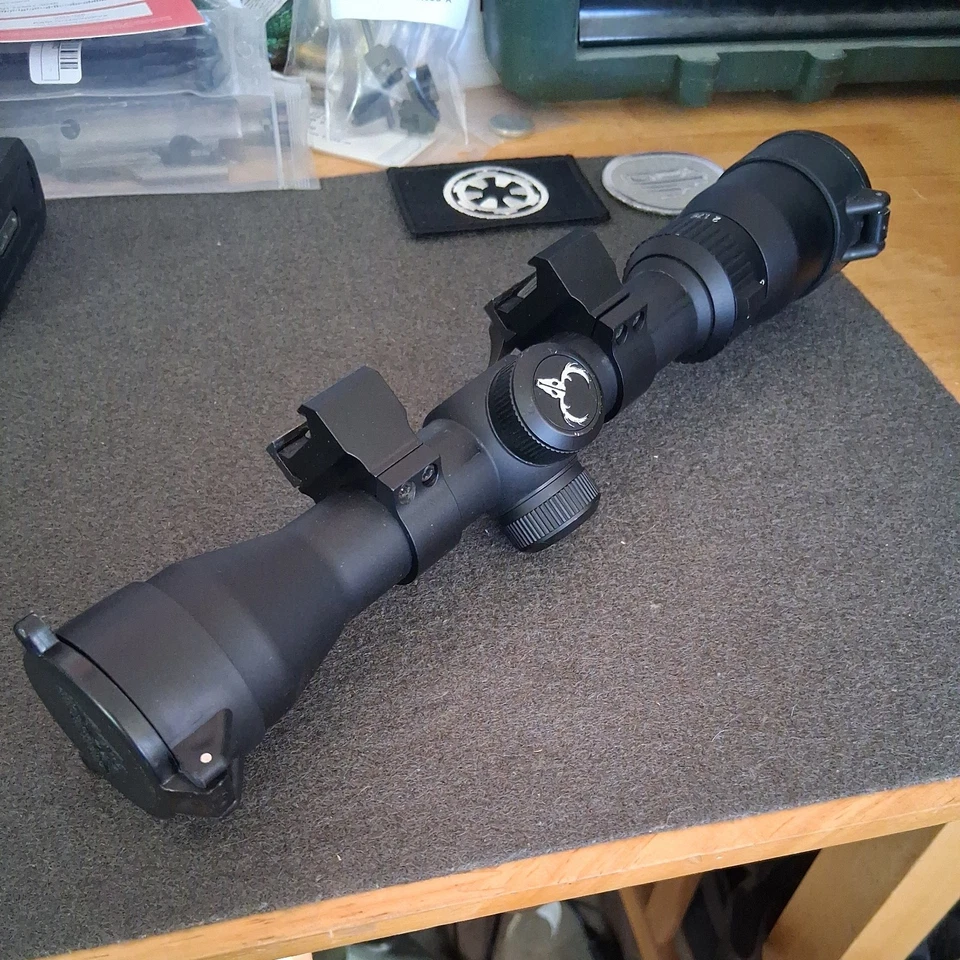 Mira para rifle Bushnell Banner 1,75-4x retícula circular X con anillos y tapas (10AL25KD) Foto 4 de 4