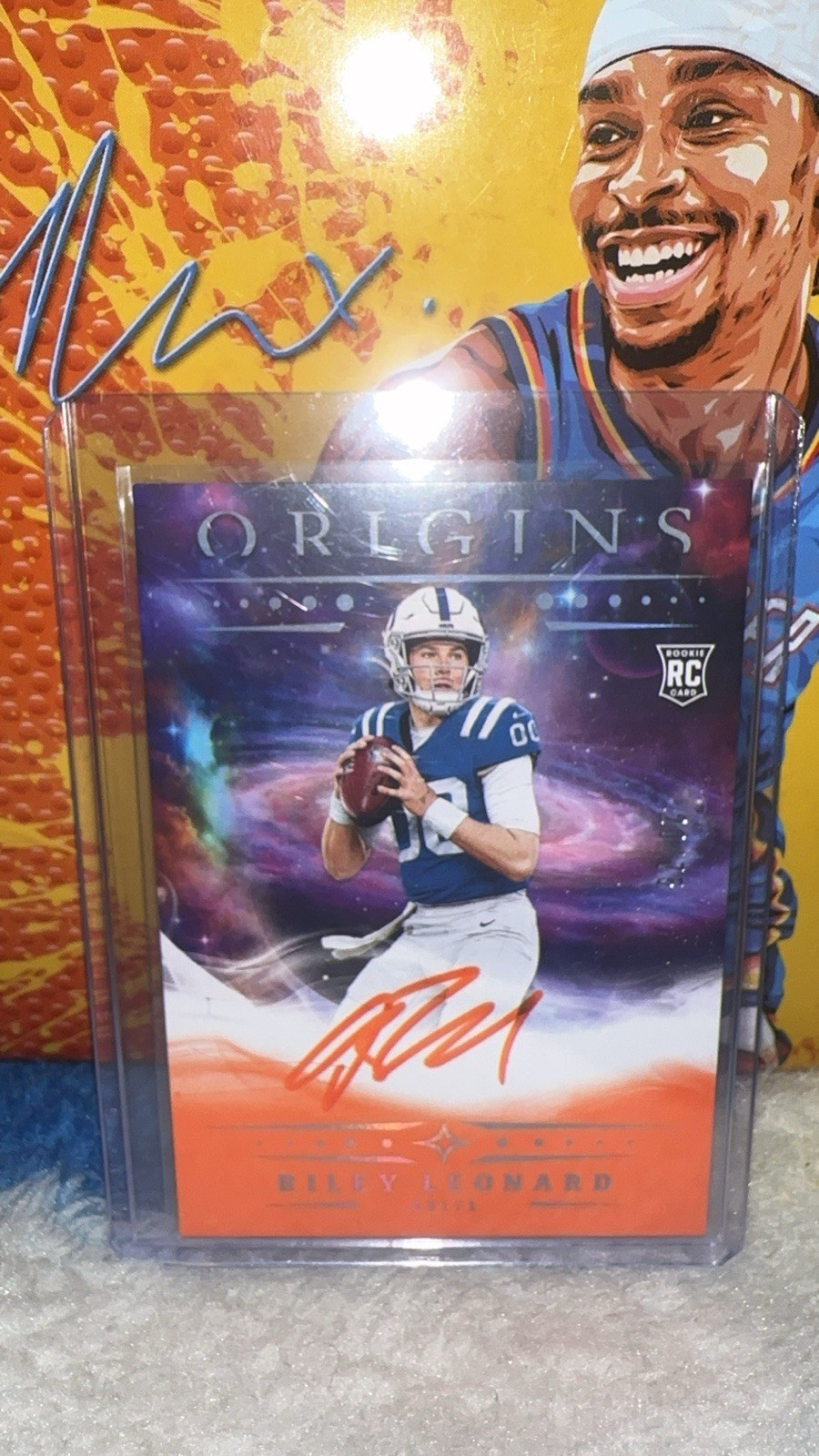 2025 Panini Origins - Rookie Autographs Riley Leonard #RA-RLE Orange/75 (AU, RC)