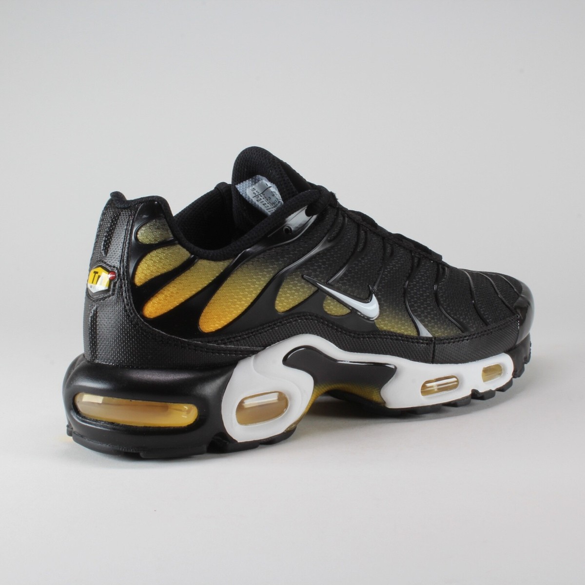 nike tn air max plus black yellow