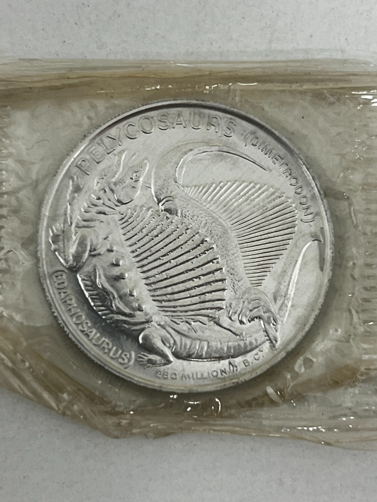 Post Cereal PELYCOSAURS Dinosaur Coin Token Toy MIP WHEN THE WORLD WAS YOUNG