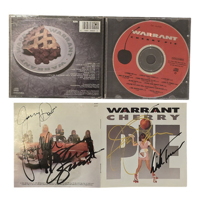 Warrant signed cd Cherry Pie by 5 musicians