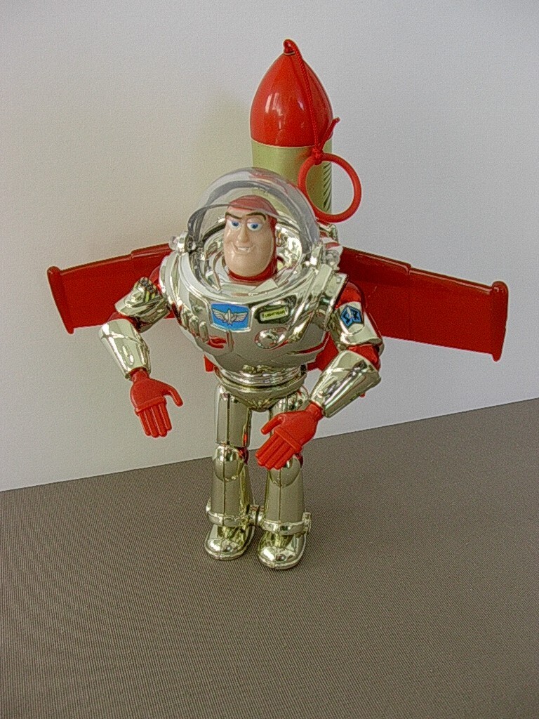 Jouet Buzz l'Éclair Toy Story : fusée spatiale blanche pour décorer une chambre d'enfant