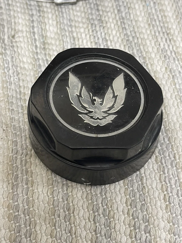 Tapa central Pontiac Firebird 10004652 negra/plateada Bird de colección años 80 tapa corta 1,5 pulgadas Foto 3 de 4