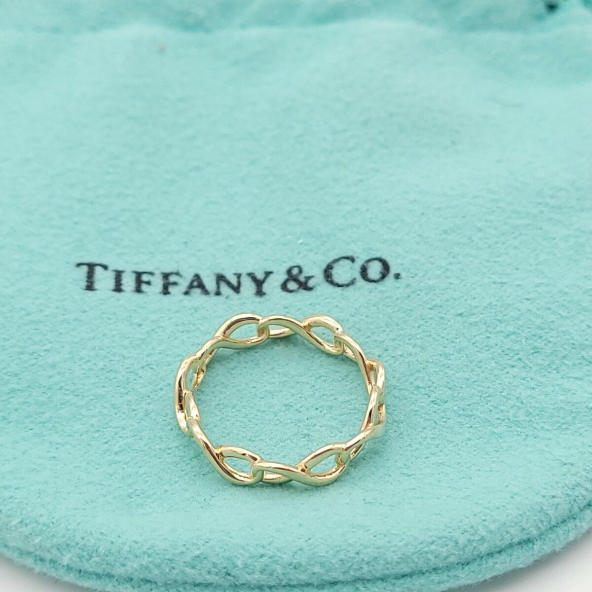 Tiffany & Co. AU750 18 Karat Yellow Gold Infinity Narrow Tiffany & Co. AU750 18 Karat Yellow Gold Infinity Narrow