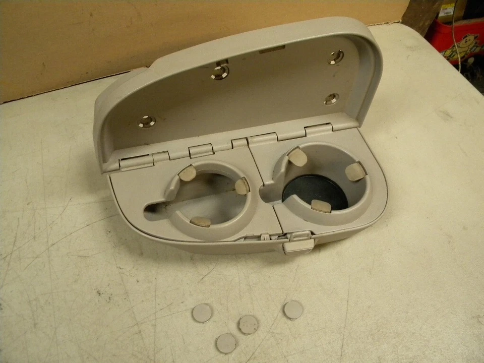 Nissan Quest 2005 portavasos de fábrica asiento del conductor izquierdo portavasos color gris Foto 2 de 4