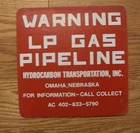 Vintage "WARNING LP GAS PIPELINE HYDROCARBON TRANSPORTATION, INC." SIGN 9" x 9"