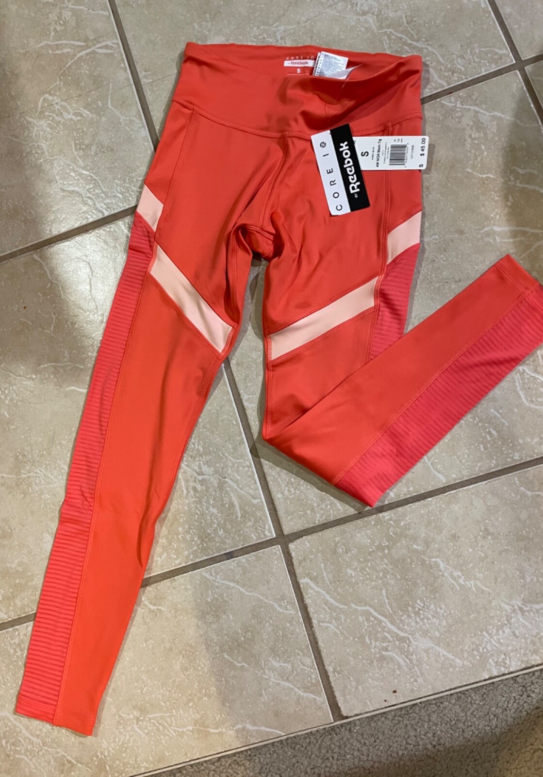 Women’s Reebok core 10 leggings with mesh cutouts!
