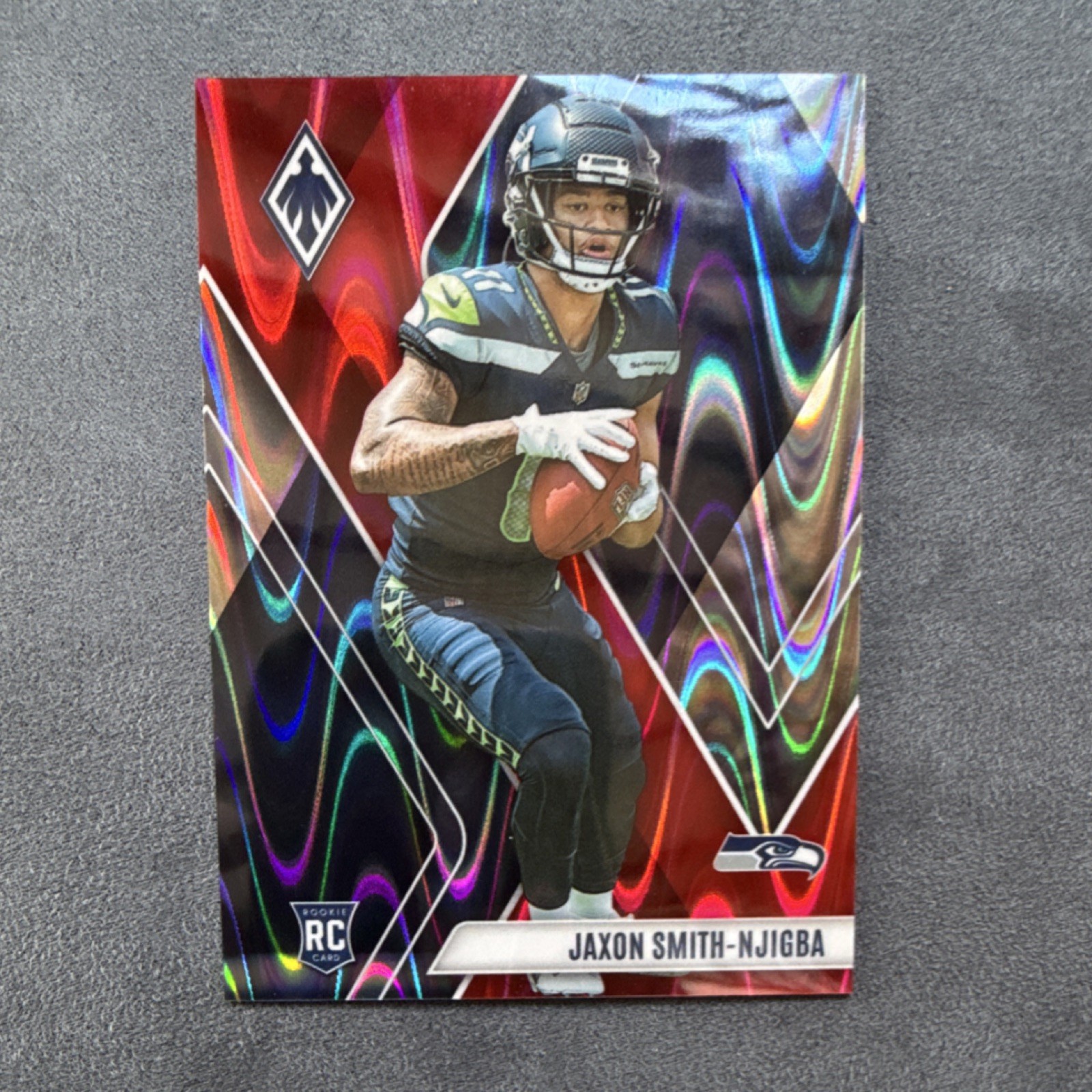 2023 Panini Phoenix Red Seismic Jaxon Smith-Njigba #106 Seahawks Rookie /199
