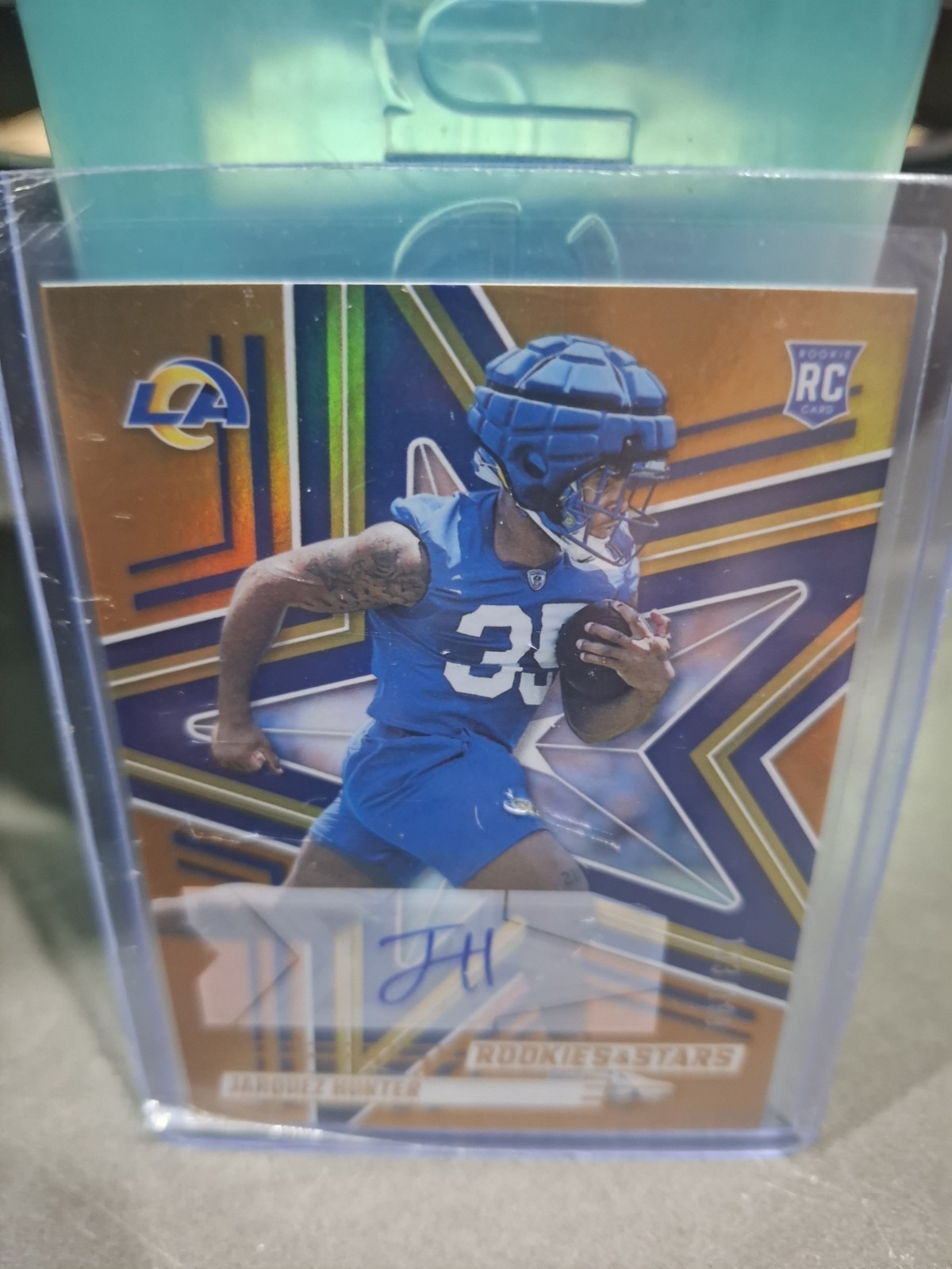2025 Panini Absolute Rookies Jarquez Hunter #136 Orange Holo Auto /199 Rams RC