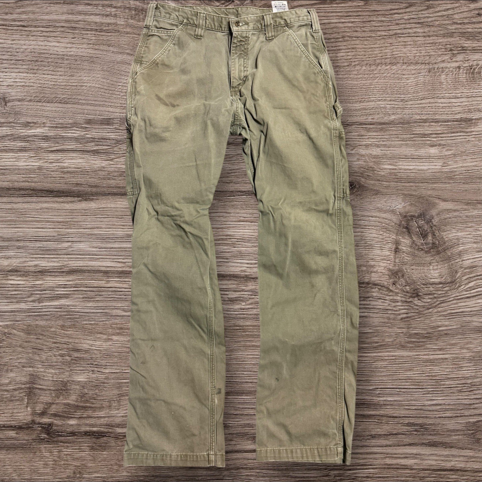Vintage Carhartt olive green carpenter pants workwear B324 ARG relaxed fit 34x32