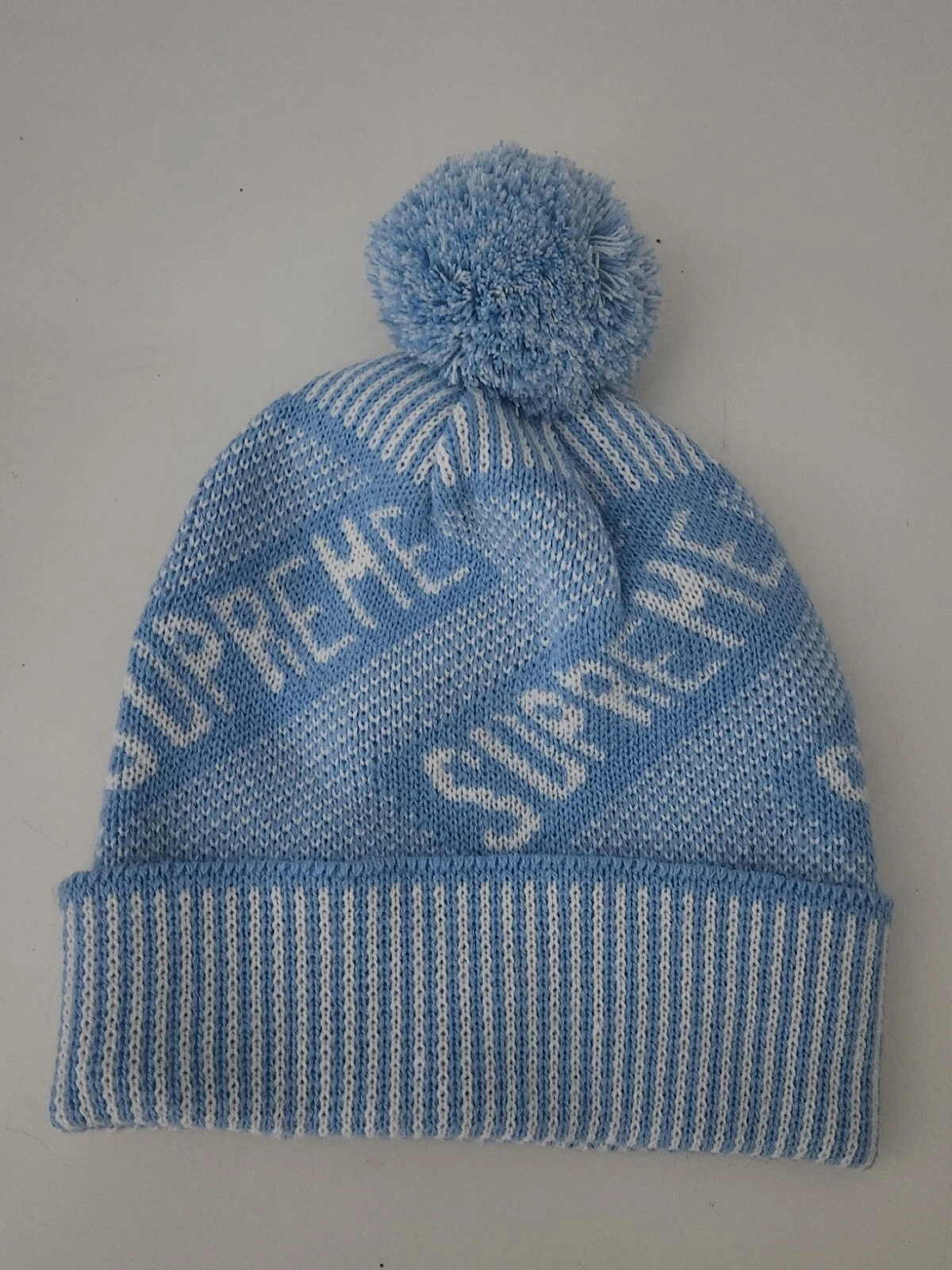 FW21 Supreme Banner beanie Light Blue Cuffed Hat Knit Logos At Crown