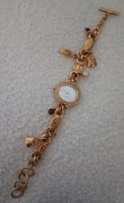 KATHERINE HAMNETT Ladies Charm Bracelet Watch Gold Tone