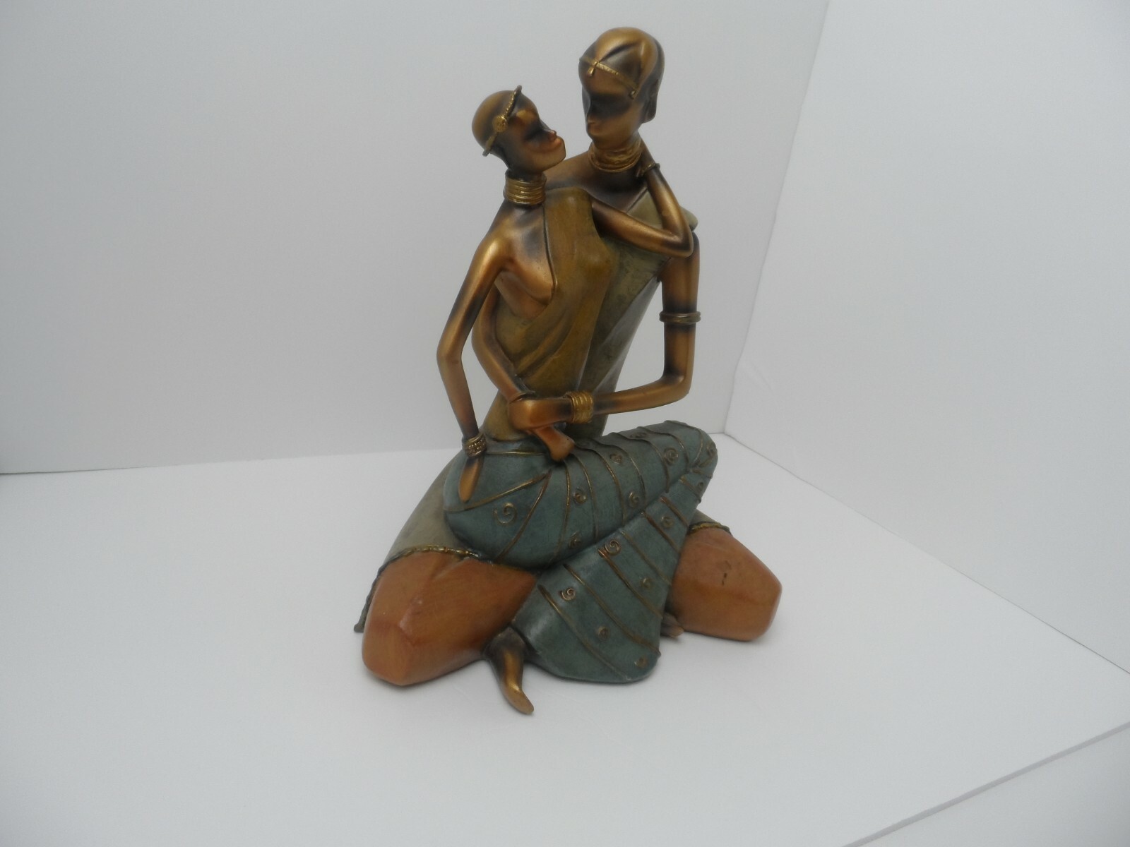 Statue Of Man and Woman Sitting 13" Tall Resin No Maker Mark Bronze Finish