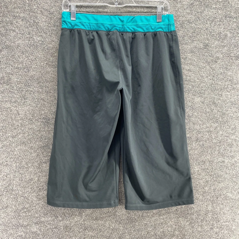 Pantalones Cortos Reebok Mujer M Medianos Negros Compresión Tiro Medio Cintura Elástica Frente Plano Foto 2 de 4