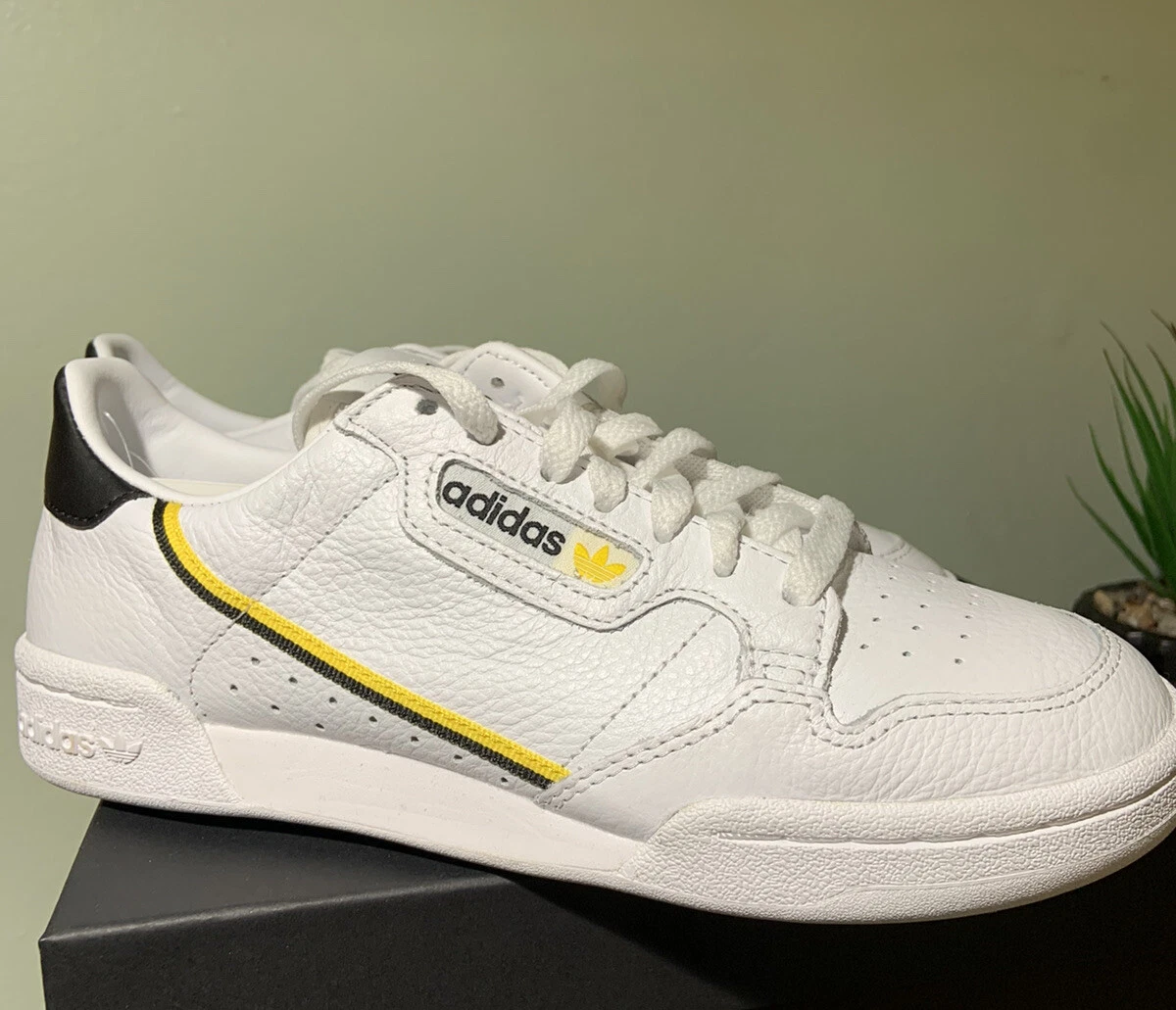 Adidas continental 80 white shop yellow black