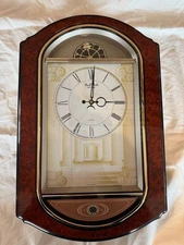 Rhythm Small World Sign of Times Zodiac Magic Sound & Motion Clock 4MH744NR