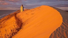 Landscape nature sand dunes lighthouse water sea clouds Custom Gaming Mat Desk
