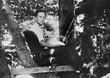 Jack Richard sitting a tree a dog lap during a national tree sittin- Old Photo