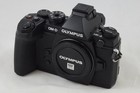 Olympus OM-D E-M1 Mirrorless Digital Camera 16MP 3-Inch LCD (Body Only) (Black)