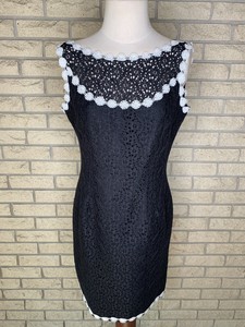 black dress with white lace trim