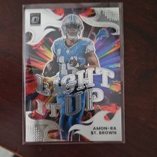 2025 Panini Donruss Optic Light It Up Insert Amon-Ra St. Brown Lions #15