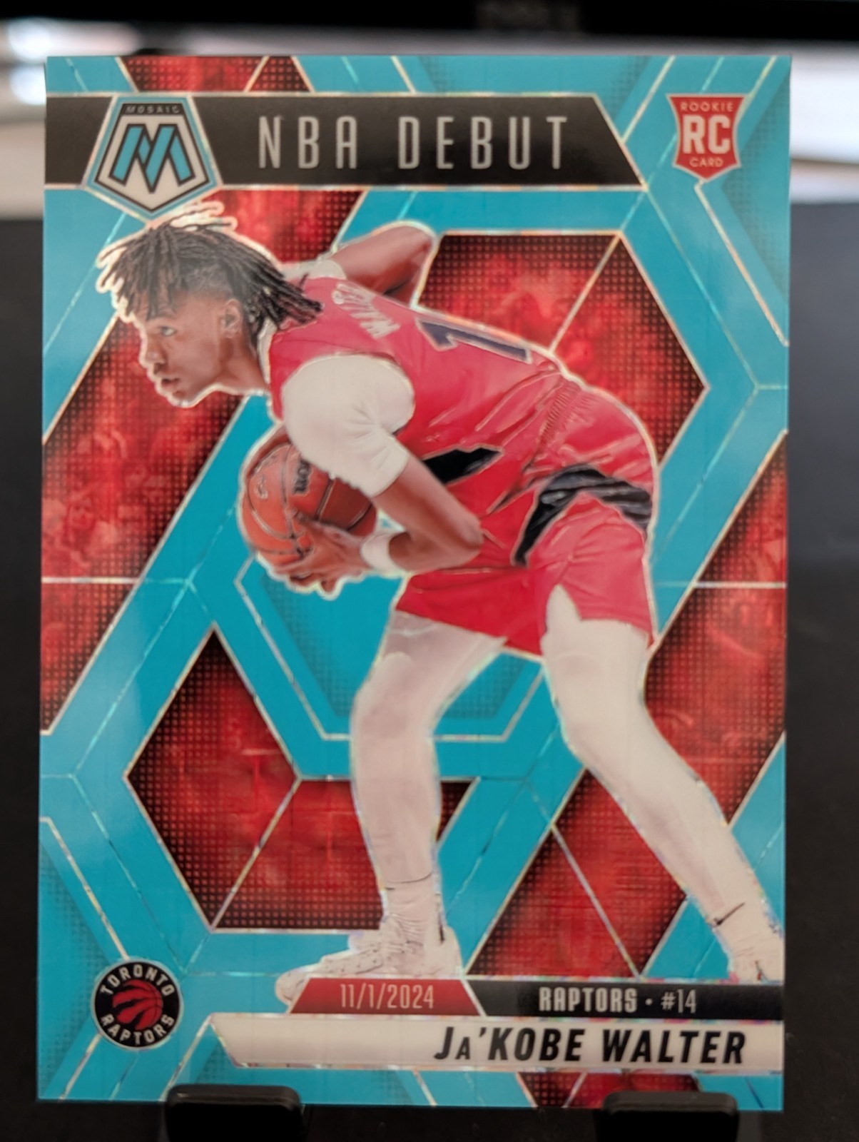 2024-25 Mosaic Ja’Kobe Walter NBA Debut Blue Fluorescent RC #253 /75 Raptors